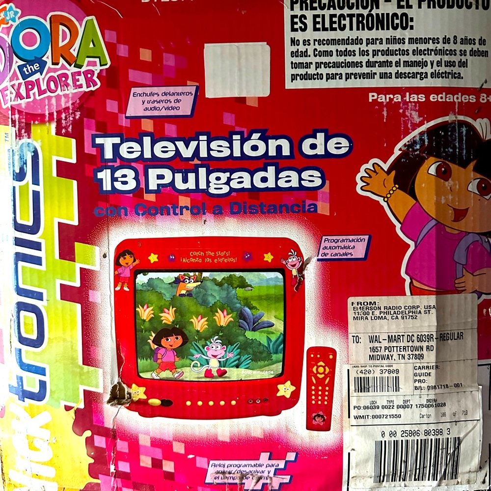 Vintage Dora tv includes the original box, remote, wires, and even manual.